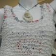 Laurie Warden for Legal Sea Foods. Garments created from recycled lobster bibs, plastic takeout bags and clam shells. 