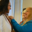 Nursing inductees are given Alpha Delta Nu Honor Society pins and cords by BSC Nursing faculty
