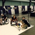 Mark DeFazio ('17) helps Karen Kelly ('17) stabilize a racing wheelchair at the 2016 Abilities Expo in Boston.