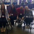 Group picture of some of the PTA class of 2017 playing wheelchair basketball with the instructor at the 2016 Abilities Expo. L to R: Beth Auld ('17), Hannah Simmons ('17), Kristina Florio ('17), Instructor/presenter at the Expo, Serra Wildman ('17)