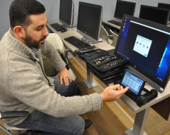 Professor Brandon Catalan in Salve's new digital forensics lab